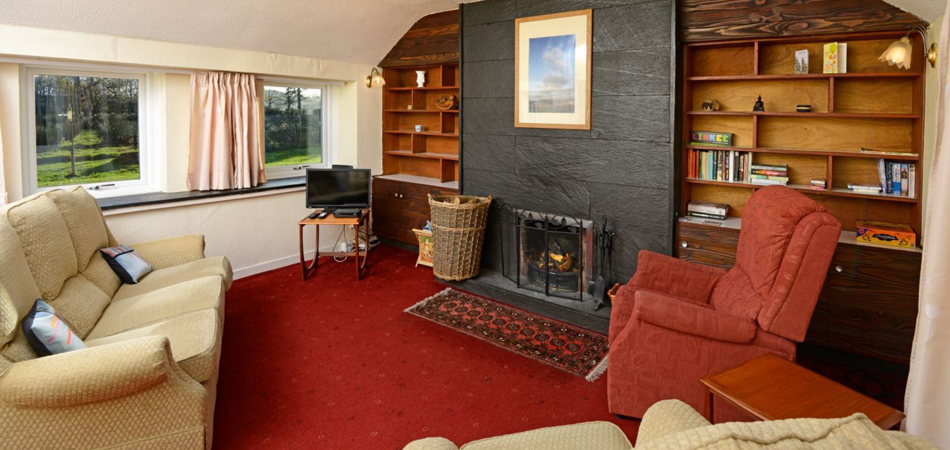 Woodsedge self catering cottage in Dumfries and Galloway features an open fire