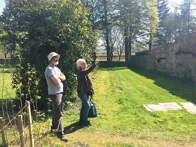 Helen and Chris discussing the installation of the garden mosaic at Kirkennan