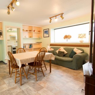 The separate dining room also incorporates a relaxing seating area 