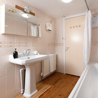 There is a washroom on each floor - photo shows first floor bathroom.