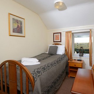 Small, but perfectly formed, the single bedroom looks out over the enclosed rear garden