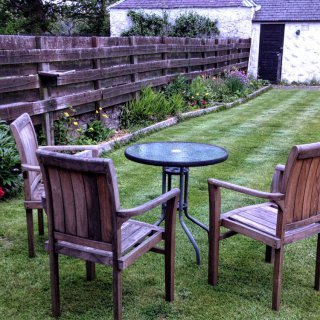 The enclosed rear garden is great for sitting out, dogs are welcome. 