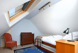 The attic room is normally single, but can have twin beds.