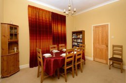 Note - the spacious dining room now has a wooden floor