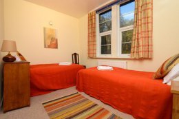 The twin bedroom on the ground floor affords views of the Estate.