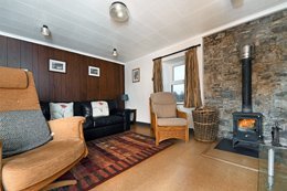 Enjoy cozy evenings in the comfortable sitting room