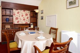 The dining area can be arranged to seat up to 5.