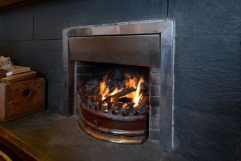 The Lodge has an open fire for cozy evenings in