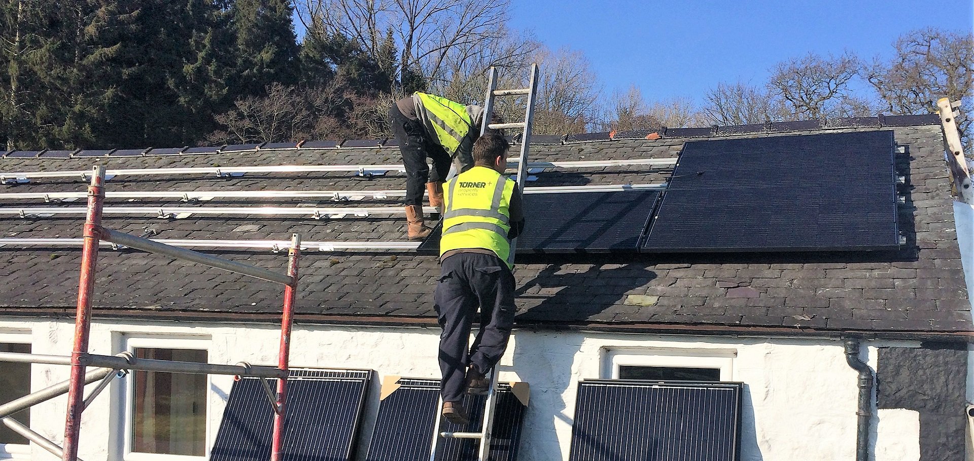 Installing solar panels at Kirkennan Estate Holiday Cottages