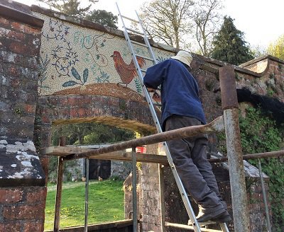 Chris grouting the garden mosaic