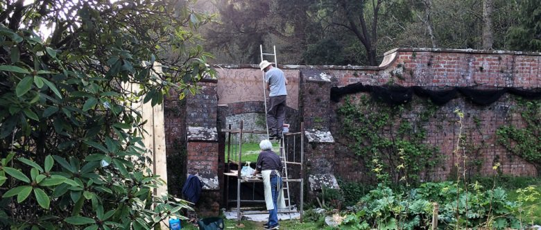 The full garden mosaic glued in place