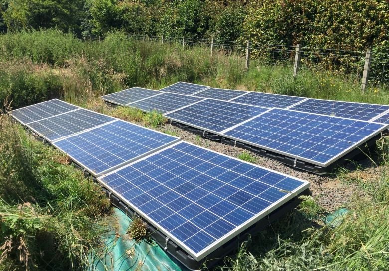 Solar panels which feed into the retrofitted ASHP at The Lodge